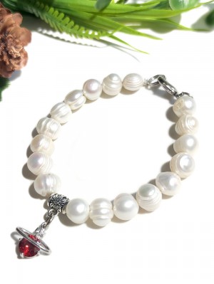 Браслет из жемчуга с подвеской планетой