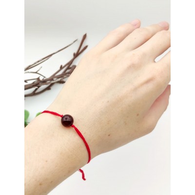 Браслет-оберег красная нить с балтийским красным янтарем